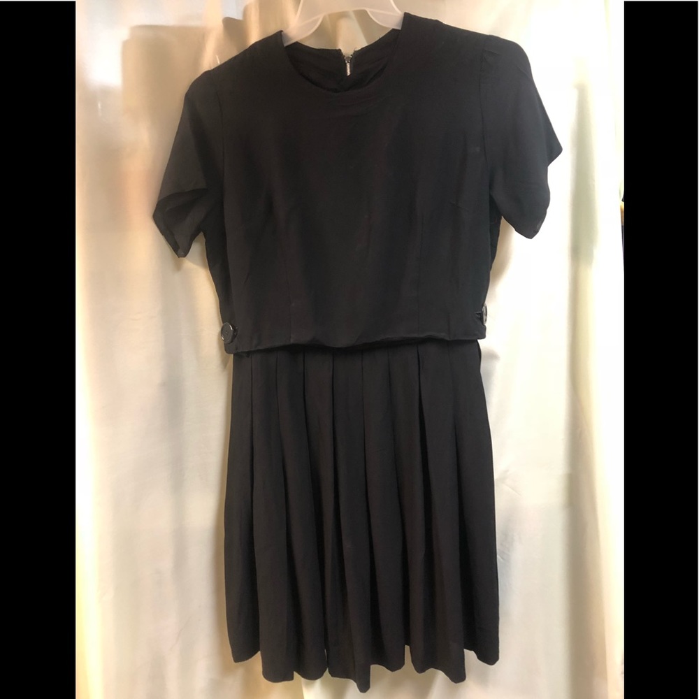 A silky, swirly, vintage 50s pleated dress